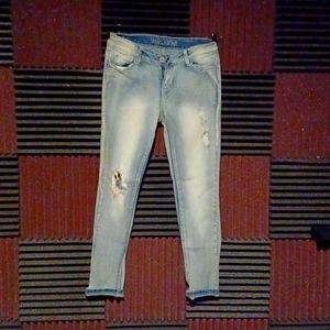 Vanilla Star brand distressed skinny jeans,  size 11, faded light blue
